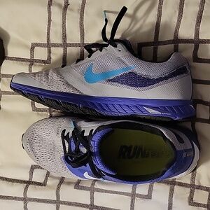 Nike Women’s. Gently worn Size 10. Grey & Purple